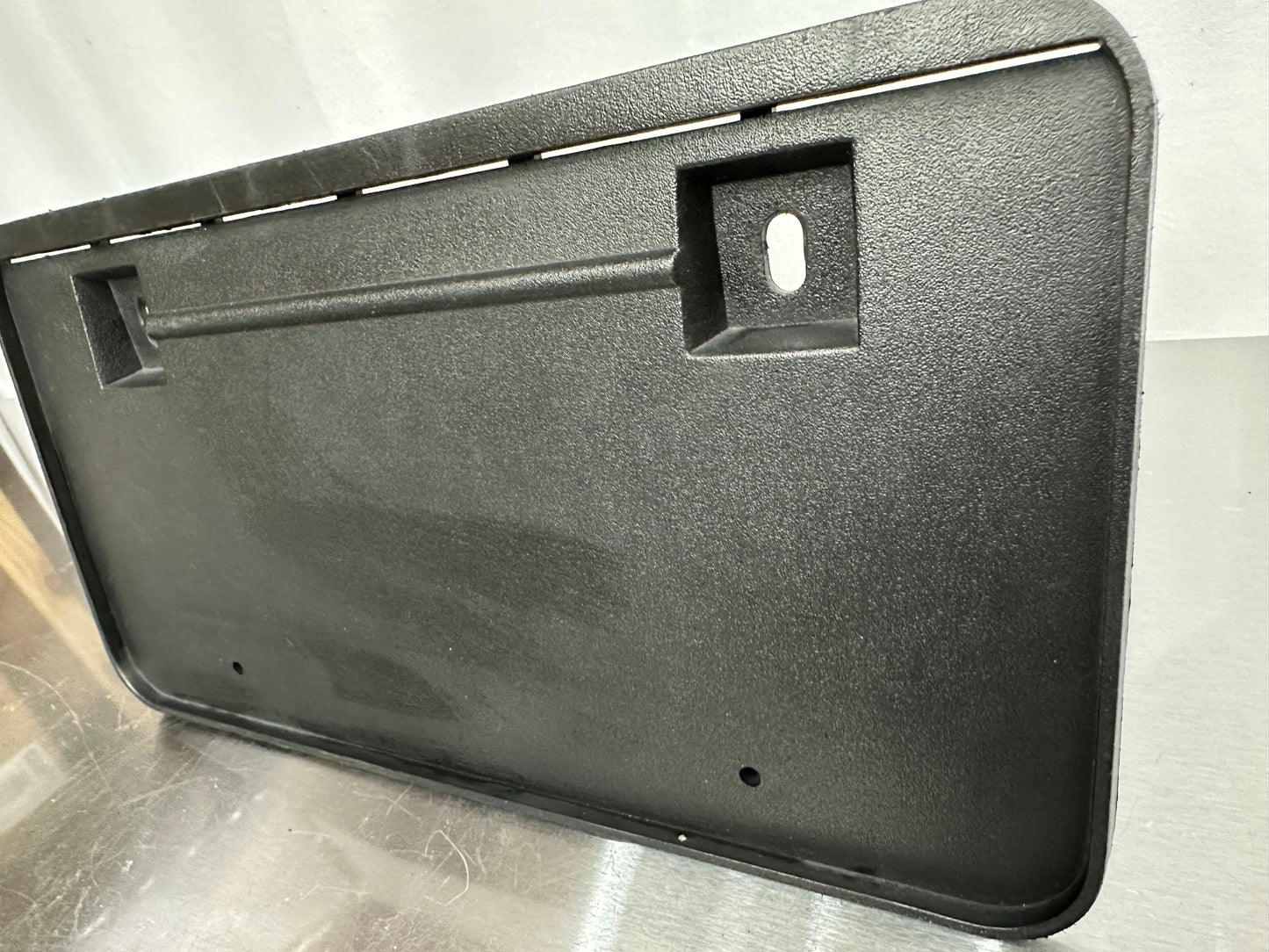 87-93 Ford Mustang Front Bumper License Plate Frame Bracket Mount OEM E5ZZ-17A385-A #01